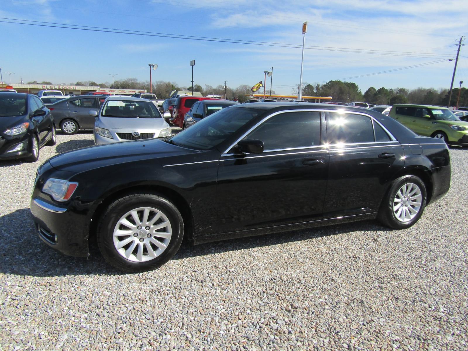 2013 Black /Tan Chrysler 300 RWD (2C3CCAAG5DH) with an 3.6L V6 SOHC 24V engine, Automatic transmission, located at 15016 S Hwy 231, Midland City, AL, 36350, (334) 983-3001, 31.306210, -85.495277 - Photo #2